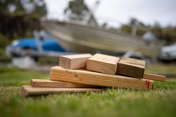 wood chocks for a caravan and camping. chocks behind a tyre. camping chocks for a boat trailer of travellers in australia