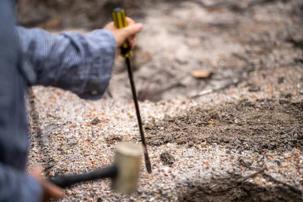 prospecting for gems and panning for gold in the bush in australia in spring