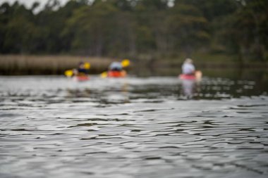 canoeing and kayaking on a river in Australia in summer