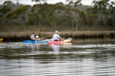 canoeing and kayaking on a river in Australia in summer