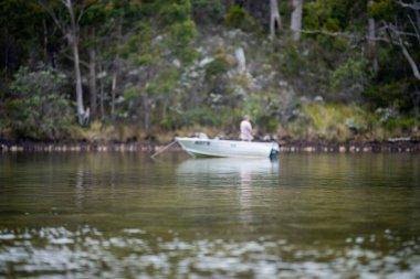friends going for a kayak on a lake in summer time in america
