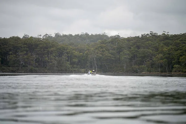 kayaking on a river in america with friends in summertime