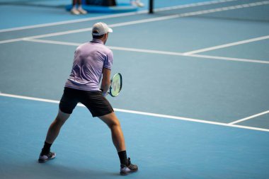 Professional athlete Tennis player playing on a court in a tennis tournament in summer in australia