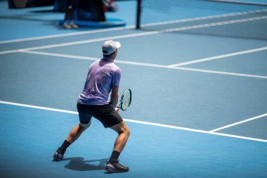Professional athlete Tennis player playing on a court in a tennis tournament in summer in australia