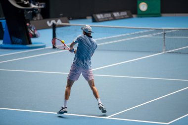 Professional athlete Tennis player playing on a court in a tennis tournament in summer in australia