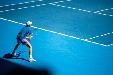 Professional athlete Tennis player playing on a court in a tennis tournament in summer in america