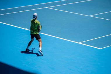 Professional athlete Tennis player playing on a court in a tennis tournament in summer in america