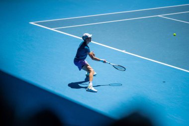 fans watching a sporting match and sporting event in a stadium in spring