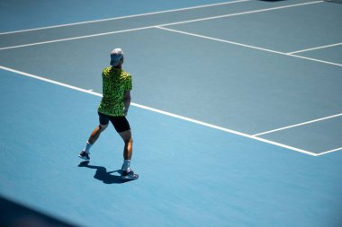 fans watching a sporting match and sporting event in a stadium in spring