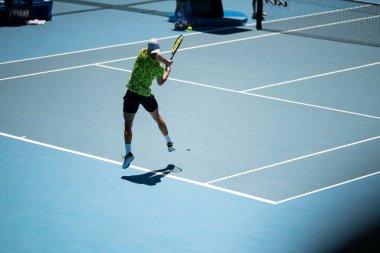 fans watching a sporting match and sporting event in a stadium in spring