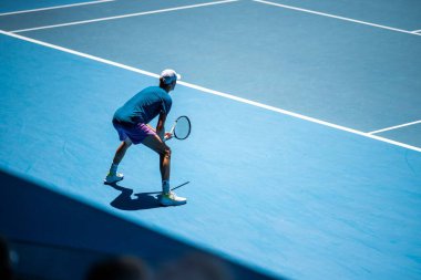 fans watching a sporting match and sporting event in a stadium in spring