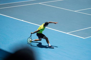 fans watching a sporting match and sporting event in a stadium in spring