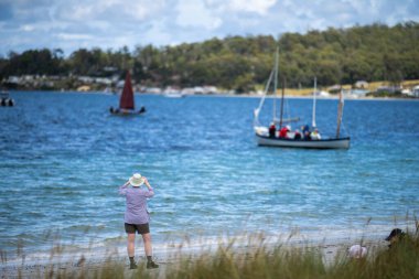 wooden boat on the water, at the wooden boat festival in hobart tasmania australia in summe