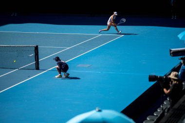 Professional athlete playing tennis on a sports court in europe. 