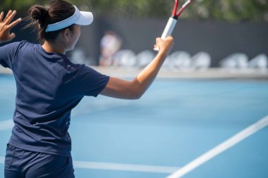 fans watching a sporting match and sporting event in a stadium