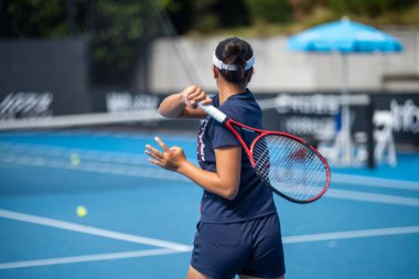 fans watching a sporting match and sporting event in a stadium