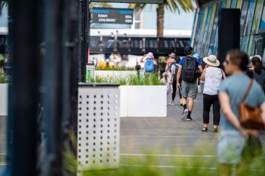 fans watching a sporting match and sporting event in a stadium