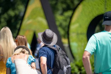 female Professional athlete Tennis player playing on a court in a tennis tournament in summer