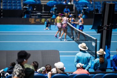 female Professional athlete Tennis player playing on a court in a tennis tournament in summer