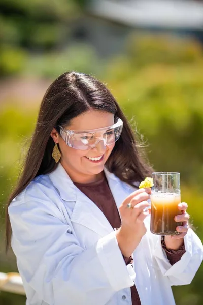 Soil test, female agricultural scientist conducting a soil test in a scientific lab in. soil agricultural agronomist in australia, soil microbial test in a scientific lab.
