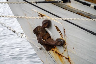 tall ships at the wooden boat festival in hobart tasmania australia. sailing on the ocean. with people watching in summer