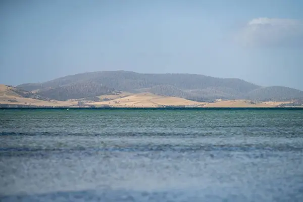 tasmanian beach island landscape across the ocean in summer