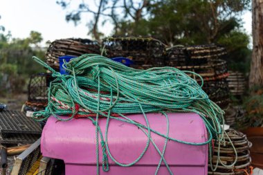 rope on a lobster fishing boat in tasmania australia clipart