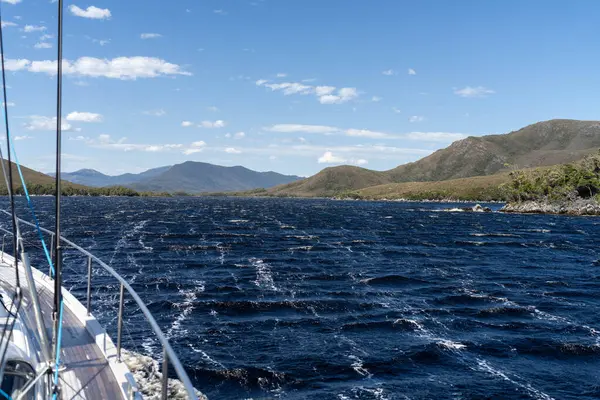 stock image sailing on a yacht in the australian in the remote forest wilderness in spring in australia and new zealand