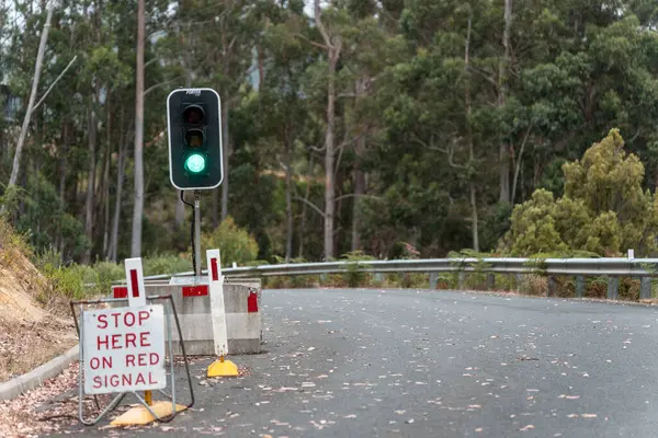 australian traffic lights for road works in rural australia in summer