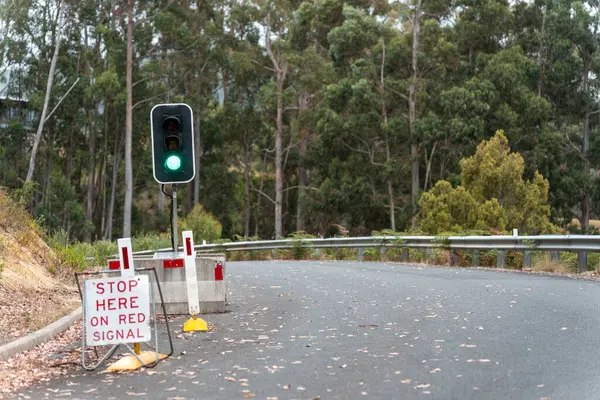 australian traffic lights for road works in rural australia in summer