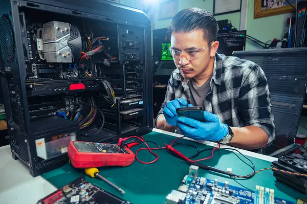 The technician repairing the computer. the concept of computer, CPU, motherboard, hardware, repairing, upgrade and technology.