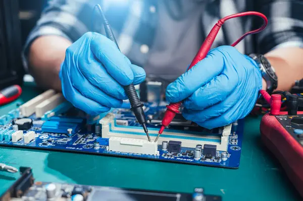 The technician repairing the computer. the concept of computer, CPU, motherboard, hardware, repairing, upgrade and technology.