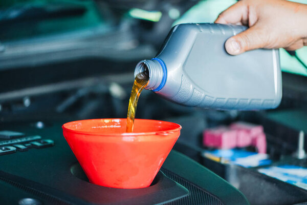 Detailed Stock Photo Mechanic Seen Refilling Engine Lubricant Precision Care Stock Photo