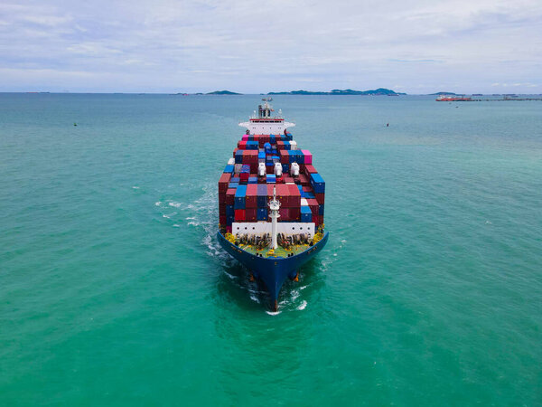 Aerial Perspective Cargo Ship Being Loaded Unloaded Bustling Seaport Sailing Royalty Free Stock Images
