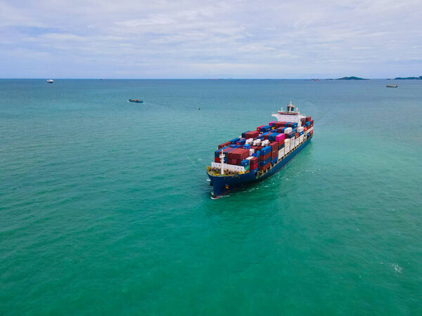 Aerial Perspective Cargo Ship Being Loaded Unloaded Bustling Seaport Sailing Royalty Free Stock Images