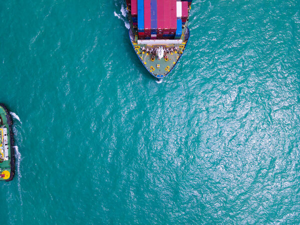 Aerial Perspective Cargo Ship Being Loaded Unloaded Bustling Seaport Sailing Royalty Free Stock Images