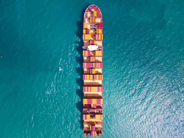 Aerial Perspective Cargo Ship Being Loaded Unloaded Bustling Seaport Sailing Royalty Free Stock Photos