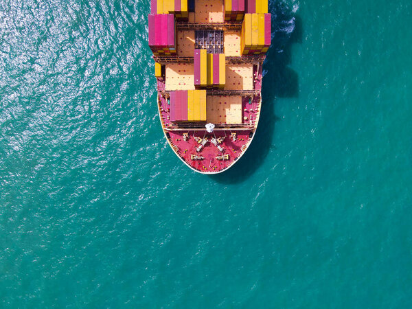 Aerial Perspective Cargo Ship Being Loaded Unloaded Bustling Seaport Sailing Royalty Free Stock Images