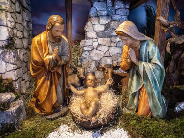 Venzone, Italy - December 29, 2022: Christmas nativity scene in the cathedral of Venzone, Italy clipart