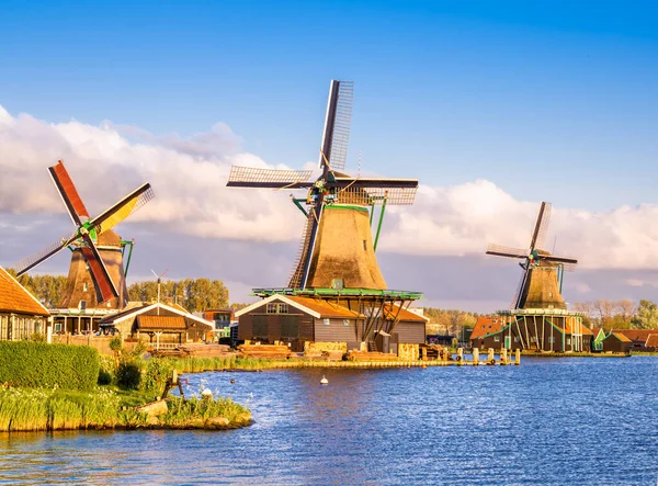 stock image Traditional Dutch windmills in the rural landscape of Zaanse Schans