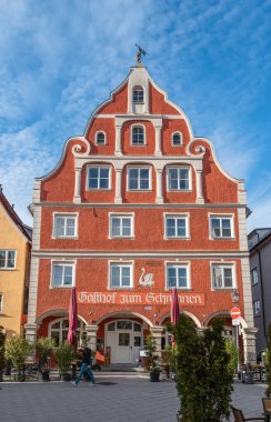 Memmingen, Germany - March 14, 2024: Historical Gasthof yum Schwannen in Memmingen, a town in the Bavarian administrative region of Swabia. clipart