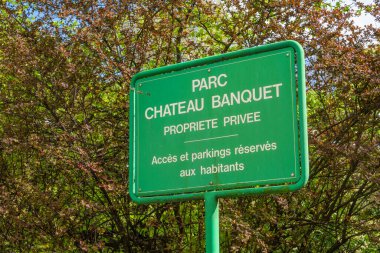 Geneva, Switzerland - April 5, 2024: Parc Chateau Banquet - The Park of Banquet castle. Green Signboard clipart