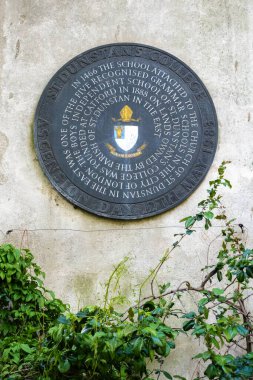 London, United Kingdom - April 29, 2024: Commemorative plaque of St. Dunstan in the East Church Garden and Ruins. clipart