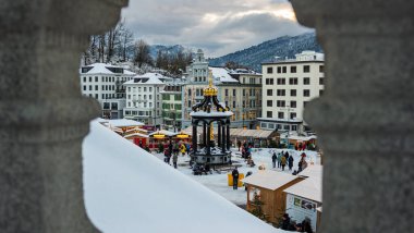 Einsiedeln, Switzerlan - December 5, 2023: Christmas market in Einsiedeln, a village in the Swiss canton of Schwyz. It is known for the Monastery, the most important baroque building in Switzerland clipart