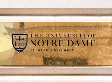 London, United Kingdom - June 25, 2024: Golden University of Notre Dame sign in England. clipart