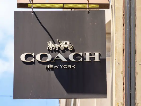 Stock image London, United Kingdom - June 25, 2024: Coach New York is an American luxury fashion house specializing in leather goods