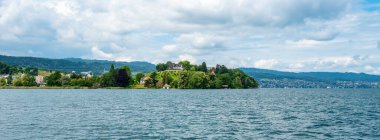 Halbinsel Au is a picturesque peninsula located on the shores of Lake Zurich in Switzerland. clipart