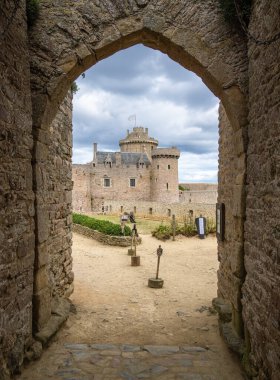 Plevenon, France - July 20, 2024: The Fort la Latte or Chateau de la Roche Goyon, a castle fortification on the coast of Brittany clipart