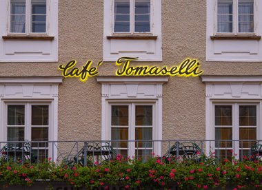 Salzburg, Austria - October 24, 2024: Cafe Tomaselli is one of the most historic and famous coffee houses in Salzburg, Austria. clipart