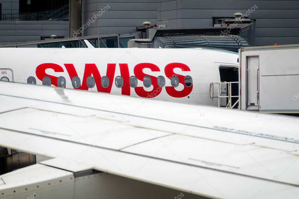 Zurich, Switzerland - November 13, 2024: Airplane with the sign of the airline Swiss company
